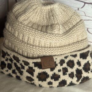 CC womens stocking hat with ponytail hole in the top.
